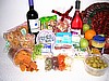 wine gift baskets with various gourmet cheese and snacks